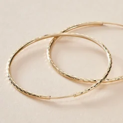 Histoire d'Or Créoles Aglavie Flexibles Or Jaune