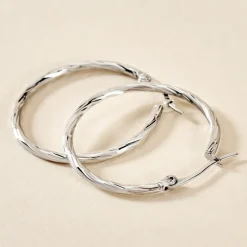 Histoire d'Or Créoles Esaias Acier Blanc