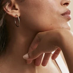 Histoire d'Or Créoles Esaias Acier Blanc