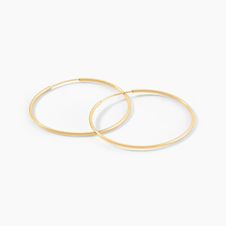 Histoire d'Or Créoles Muses Or Jaune