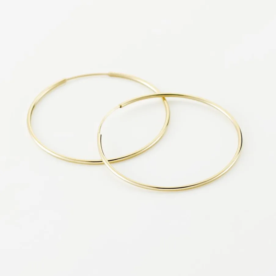 Histoire d'Or Créoles Muses Or Jaune